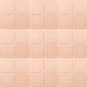 Bright pink tile with yellow design